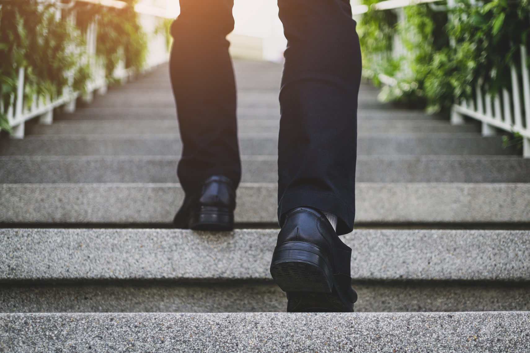 Businessperson Walking on the Stairs